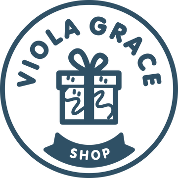 Viola Grace Shop Logo in Blue. A present, birthday gift or christmas present wrapped with a bow