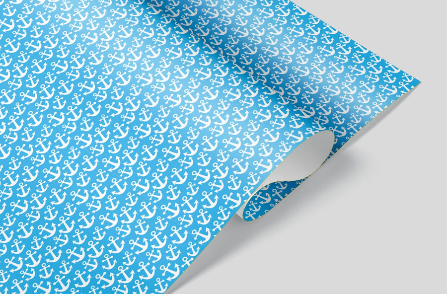 A blue wrapping paper sheet with White boat anchors