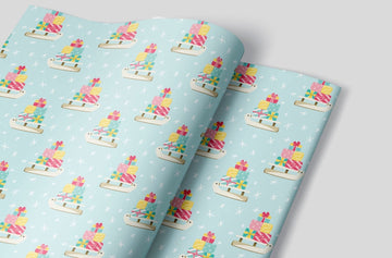 Blue Christmas Sled Wrapping Paper Alexander's 