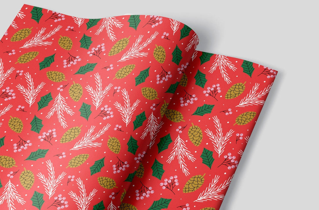Red wrapping paper with Holly, Mistletoe, Pine Cones and branches