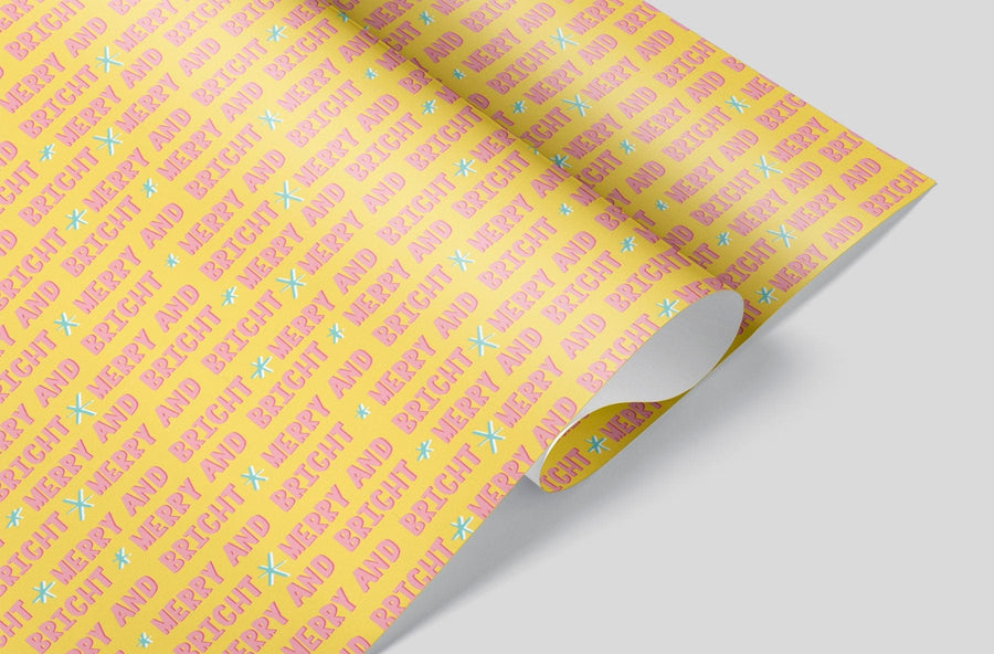Merry And Bright on Yellow Wrapping Paper Alexander's 