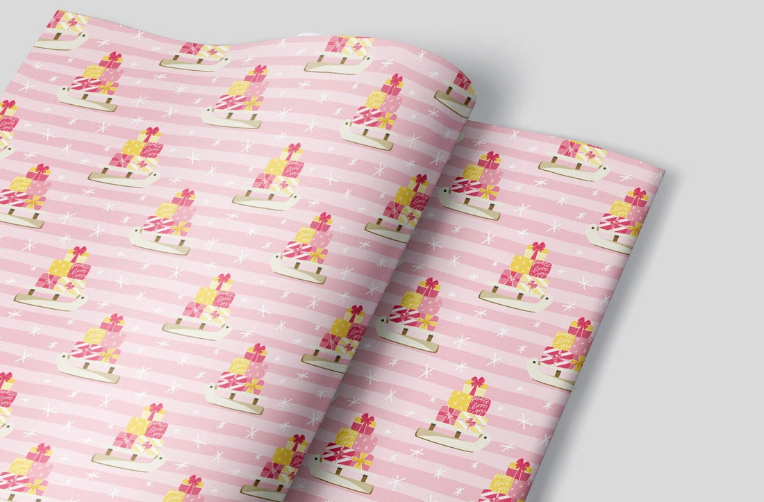Our Favorite Sleds in Pink Wrapping Paper Alexander's 