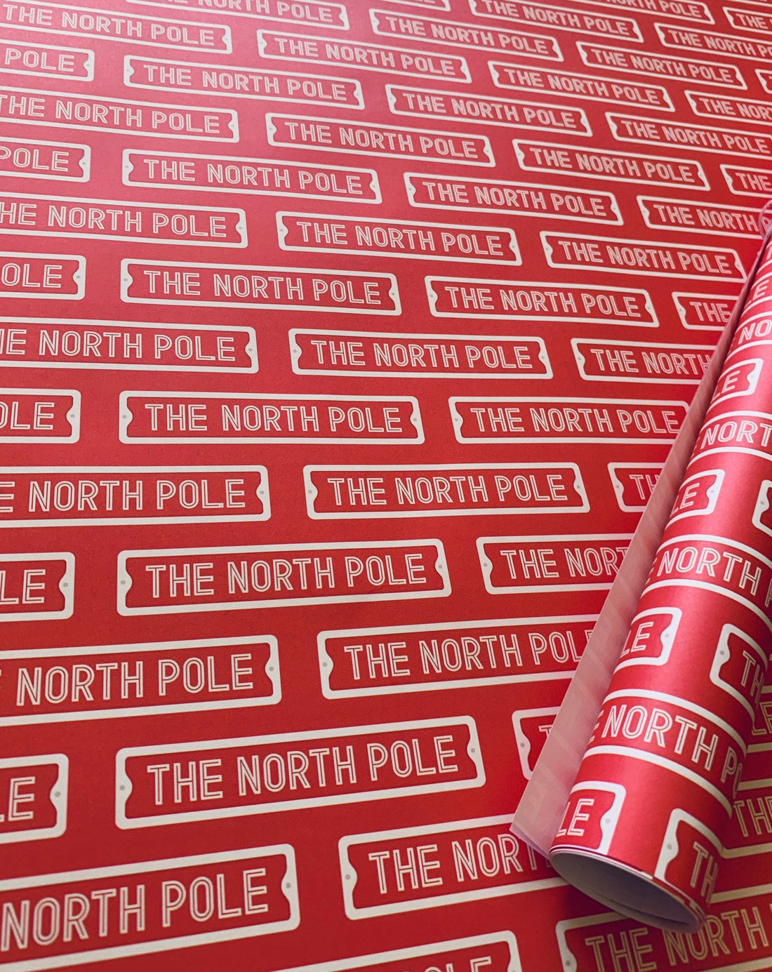 The North Pole Street Sign Wrapping Paper- Christmas Gifts from Santa -  Viola Grace