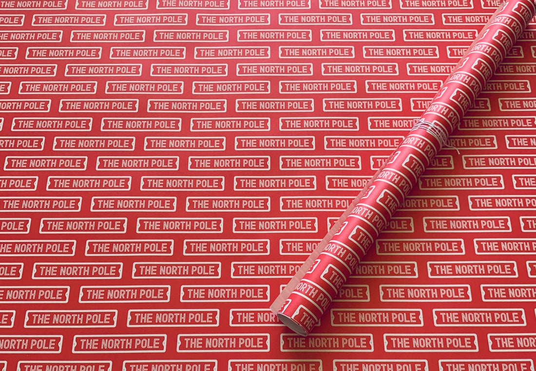 The North Pole Street Sign Wrapping Paper Alexander's 